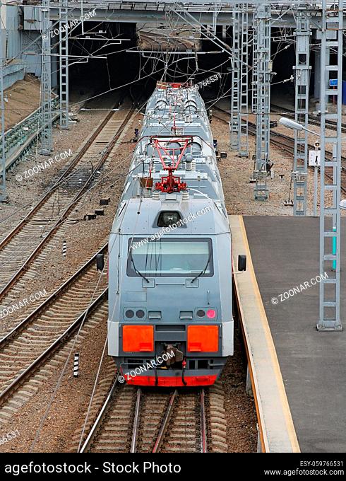 Beautiful photo of high speed modern commuter train, motion blur