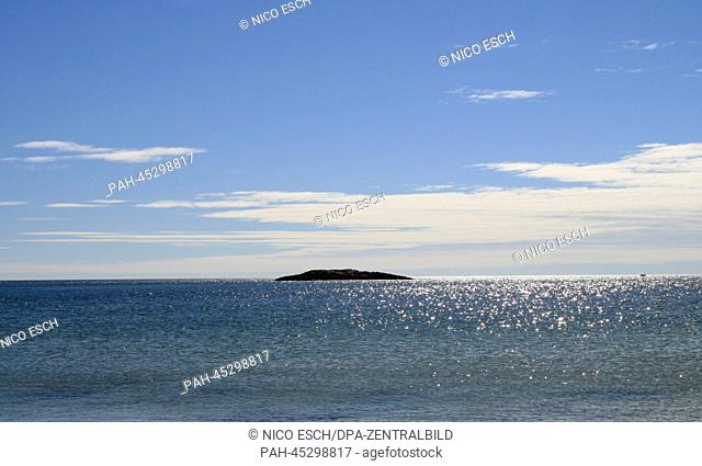 View from the 'Sand Beach' onto a rocky island in the Acadia National Park in Maine, USA, 27 September 2013. The Acadia National Park is known for its rugged...