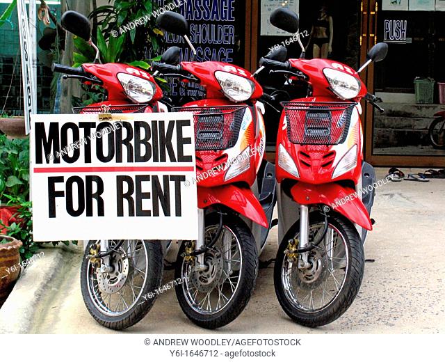 Bright red motorcycle moped for rent Ko Pha Ngan island Thailand