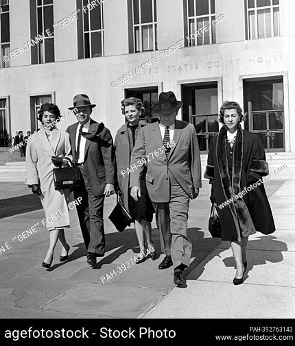 Frank Costello, second right, departs US District Court in Washington, DC on 17 February, 1960. The court was deciding a case to take away Mr