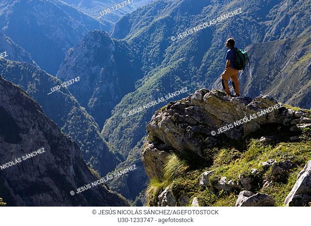 People practice mountaineering in the Cornion massif, in the Picos de Europa National Park, Sajambre Valley, Leon, Castilla y Leon  Spain