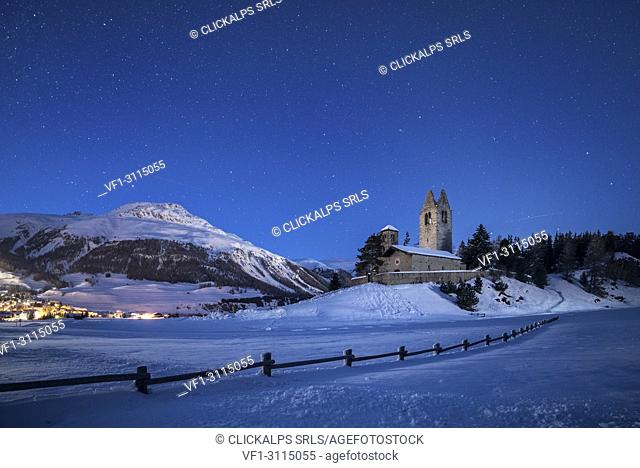 The church of San Gian during a winter night in Celerina, Canton of Graubunden, Engadin, Switzerland, Europe