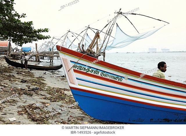 Chinese fishing nets and fishing boat, Kochi, Fort Cochin, Kerala, South India, South Asia