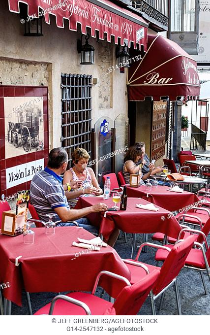 Spain, Europe, Spanish, Toledo, World Heritage Site, historic center, Meson La Posta, business, restaurant, bar, alfresco, dining, awning, red tablecloth, chair