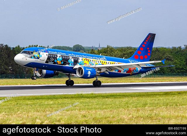 An Airbus A320 aircraft of Brussels Airlines with registration number OO-SND and the Smurfs special livery at Brussels Airport, Belgium, Europe