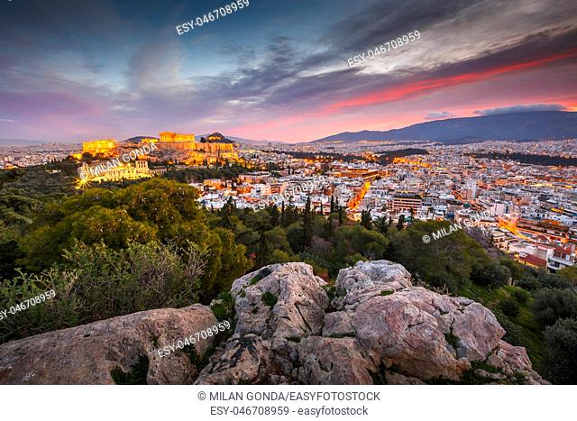 View of Acropolis from Filopappou hill at sunrise, Greece.