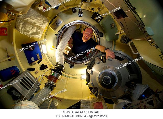 European Space Agency astronaut Alexander Gerst, Expedition 40 flight engineer, is pictured in the Rassvet Mini-Research Module 1 (MRM-1) hatch of the...
