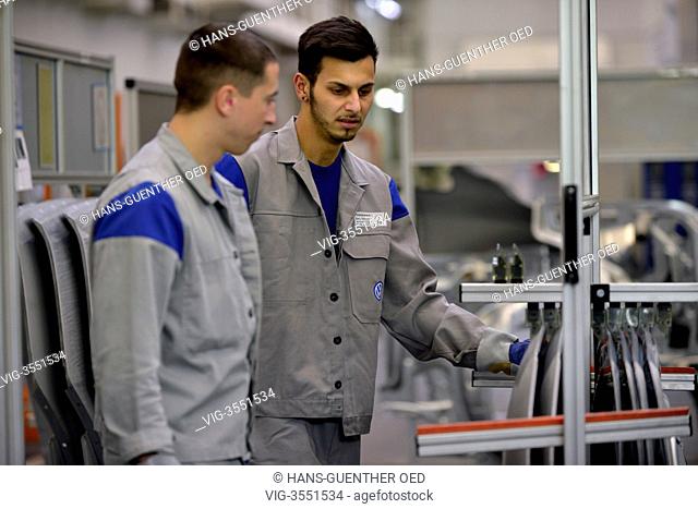 25.02.2013, Wolfsburg, GER, Germany, Production of the VW Golf VII at Wolfsburg, workers in the pressing plant - Wolfsburg, Lower Saxony, Germany, 25/02/2013