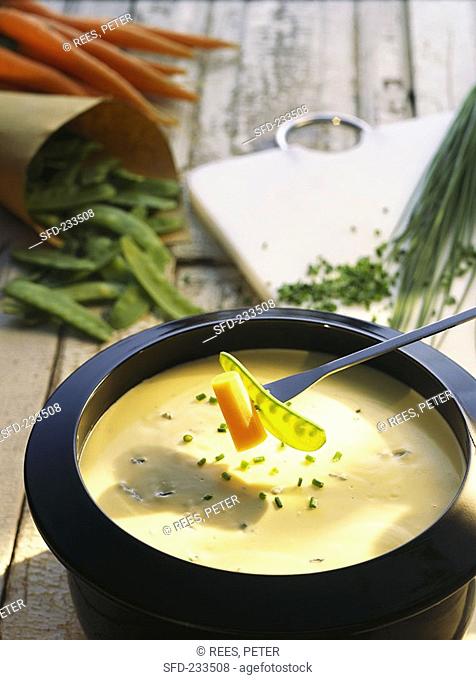 Fondue with blue cheese and vegetables