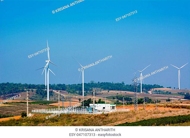 Wind turbines under the blue sky. Wind turbines generating elect