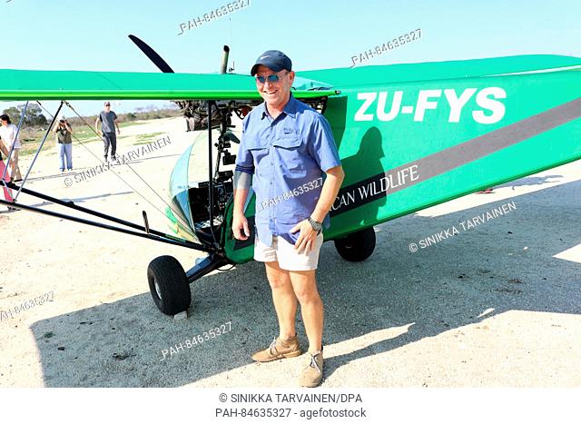 Pilot McDonald in front of a light aircraft used for wildlife observation in the Southern African Wildlife College in Hoedspruit, South Africa, 09 October 2016