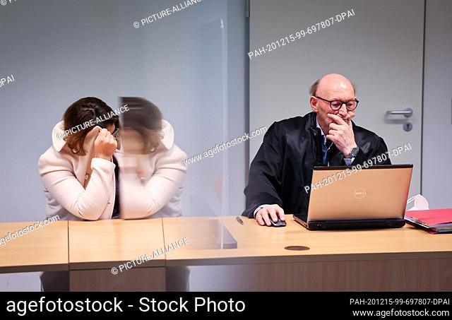15 December 2020, Hamburg: The defendant sits next to her lawyer Günter Teworte (r) in the courtroom at the Hamburg-Barmbek district court
