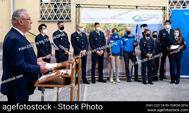 18 January 2022, Bavaria, Munich: Joachim Herrmann (l, CSU), Minister of the Interior of Bavaria, speaks at the farewell ceremony for the athletes of the...