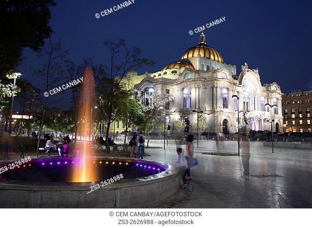 Palacio De Las Bellas Artes-Palace Of Fine Arts at night with a fountain in the foreground, Mexico City, Mexico, Central America