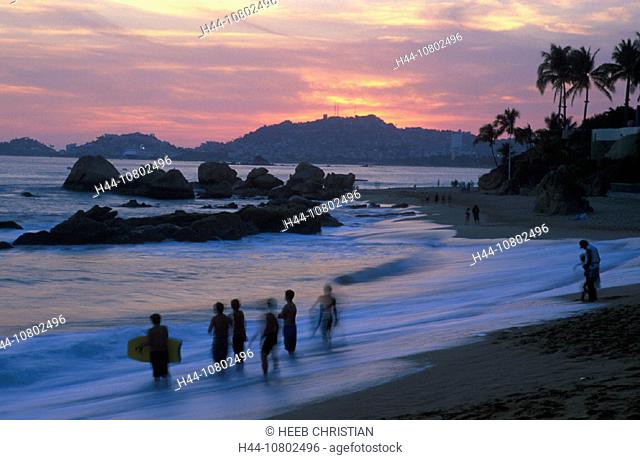 Bahia de Acapulco, Beach, coast, dusk, folks, Guerrero, Mexico, Central America, America, mood, people, rocks, sea