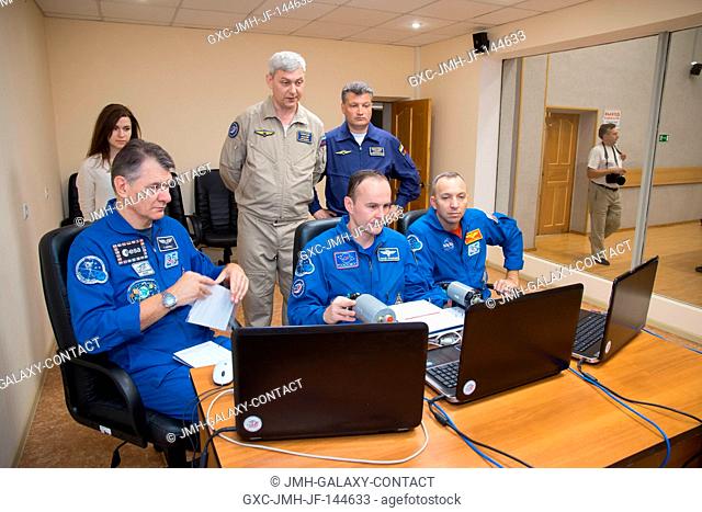 At the Cosmonaut Hotel crew quarters in Baikonur, Kazakhstan, Expedition 52-53 crewmembers Paolo Nespoli of the European Space Agency (left)