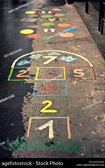 Children's hopscotch game with squares and numbers in different colors on the street