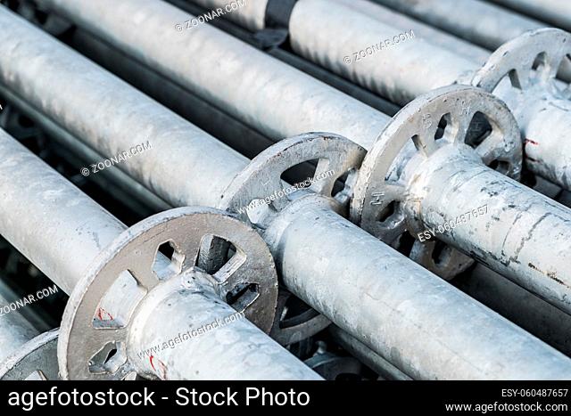 construction industry concept background - scaffolding parts closeup -