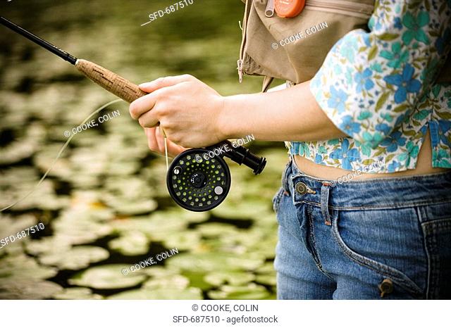 Woman with Fly Rod
