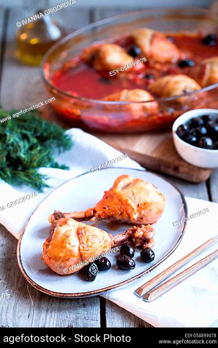 Chicken Cacciatore braised with wine, olives and tomatoes, traditional Italian dish