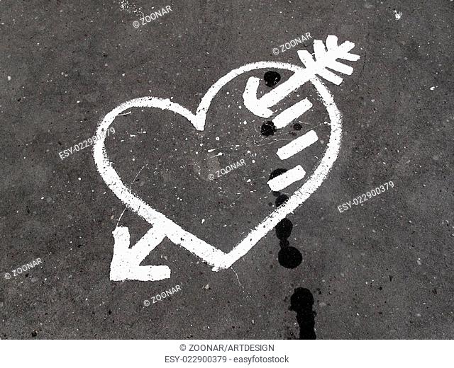 Abstract love symbol on pavement
