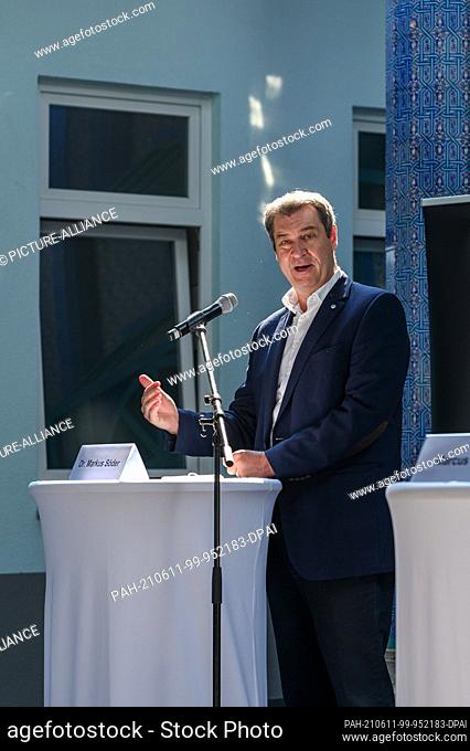 10 June 2021, Bavaria, Nuremberg: Markus Söder (CSU), Prime Minister of Bavaria, during his welcoming speech in the courtyard of the Eyüp Sultan Mosque