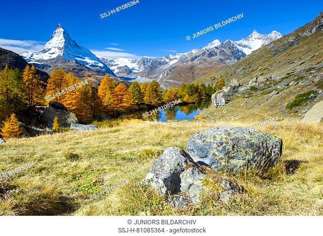 The Matterhorn (4478 m) and the mountain lake Grindjisee in autumn. Zermatt, Valais, Switzerland