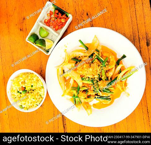 02 March 2023, Vietnam, Lap An Lagune: A Vietnamese dish of shrimp and vegetables is arranged on a plate. Photo: Alexandra Schuler/dpa