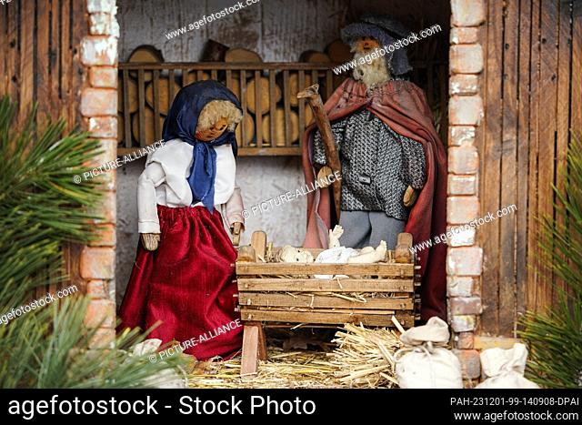 30 November 2023, Rhineland-Palatinate, Bornheim: Nativity figures stand in a crib. For more than 20 years, the wine village of Bornheim on the Southern Wine...