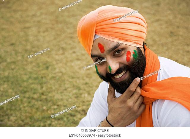 A Sikh man smiling