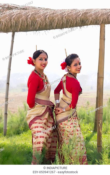 Bihu women dancing together