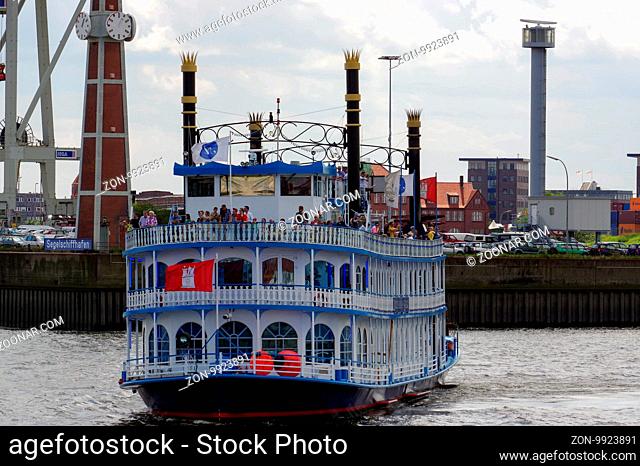 HAMBURG, GERMANY - 18 JULY 2015: A Paddle steamer Louisiana Star ferry. It's a passenger ship that is based on an American sternwheeler and used for harbor...