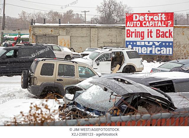 Detroit, Michigan - An auto junkyard with a sign urging ""Buy American.""