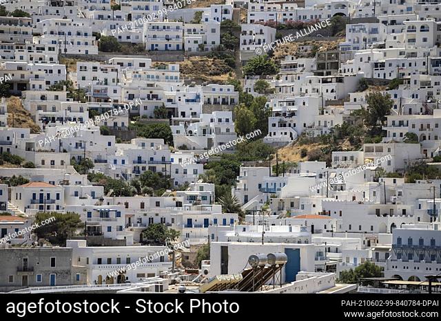 02 June 2021, Greece, Astypalea: View of the white houses on a slope of the island. Astypalea is to gradually receive a completely new transport system with...