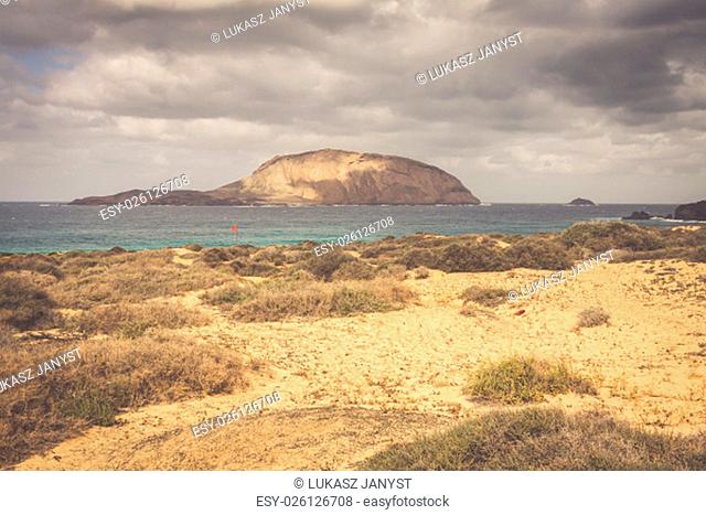 a view of playa de las conchas, a beautiful beach on la graciosa, a small island near lanzarote, canary islands, in the middle of the atlantic ocean