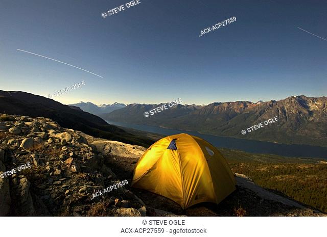 The earth turns while a backpacker sleeps the night away, British Columbia's Coast Mountains