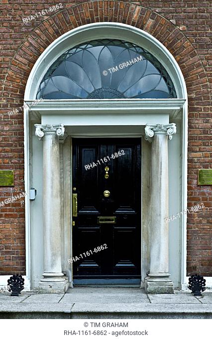 Traditional doorway with fanlight windows in Merrion Square famous for its Georgian architecture, Dublin, Ireland