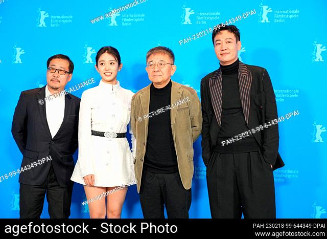 18 February 2023, Berlin: Actors Wang Hongwei (l-r), Huang Yao, director Zhang Lu and Xin Baiqing stand next to each other and wave during the photocall for...