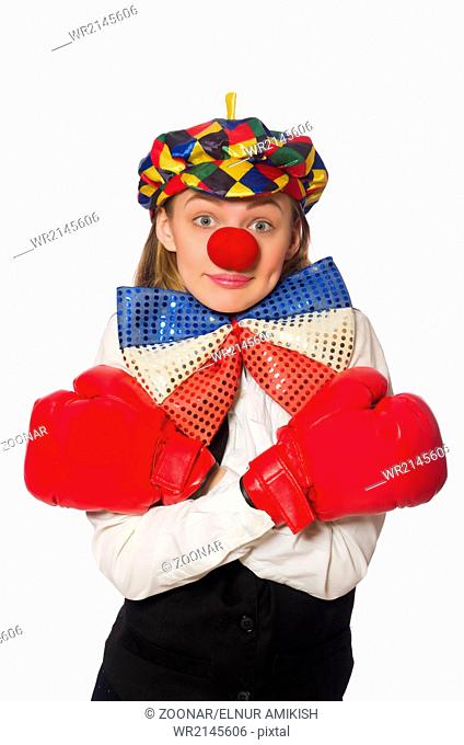 Pretty female clown with box gloves isolated on white