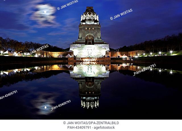 The newly renovated Battle of the Nations Monument is illuminated for the light installation 'Cosmogole' (C) in Leipzig, Germany, 16 October 2013