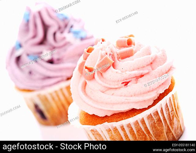 Holiday cupcakes over white background