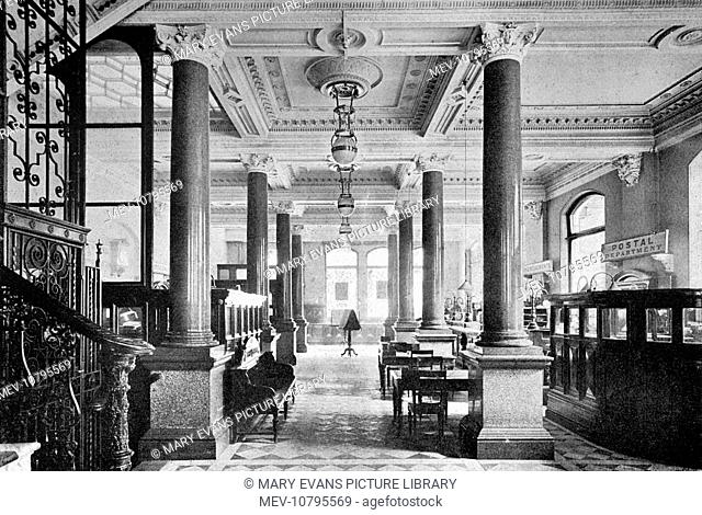 The hall of the Daily Telegraph newspaper looking very handsome with its red granite pillars. The view is taken looking towards Fleet Street