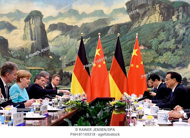 German Chancellor Angela Merkel (CDU, 2-L) and Chinese Premier Li Keqiang (R) attend a meeting at the Great Hall of the People in Beijing, China, 13 June 2016