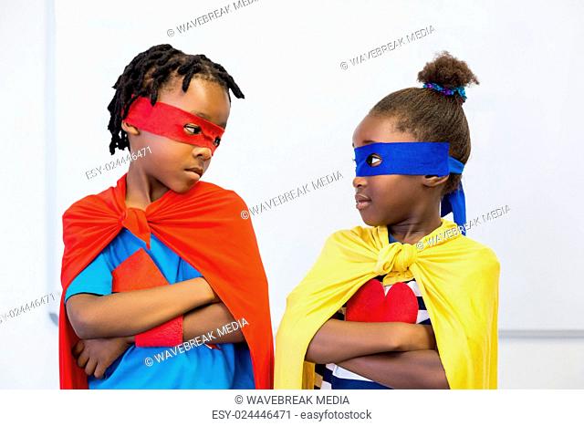 Boy and girl pretending to be a superhero