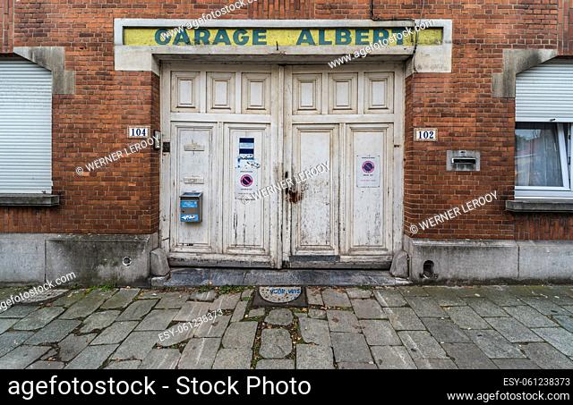 Jette, Brussels Capital Region - 10 06 2019 Vintage wooden garage port of an old local business