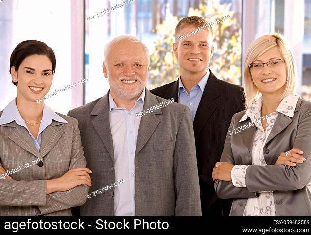 Portrait of smiling businessteam standing in office