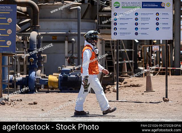 25 October 2022, Chile, Antofagasta: A worker walks through the lithium carbonate production plant of the Chilean company SQM