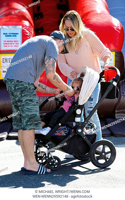 Haylie Duff with her daughter and partner, Matt Rosenberg, with former brother-in-law Mike Comrie and son Luca at the Studio City Farmers' Market in Los Angeles