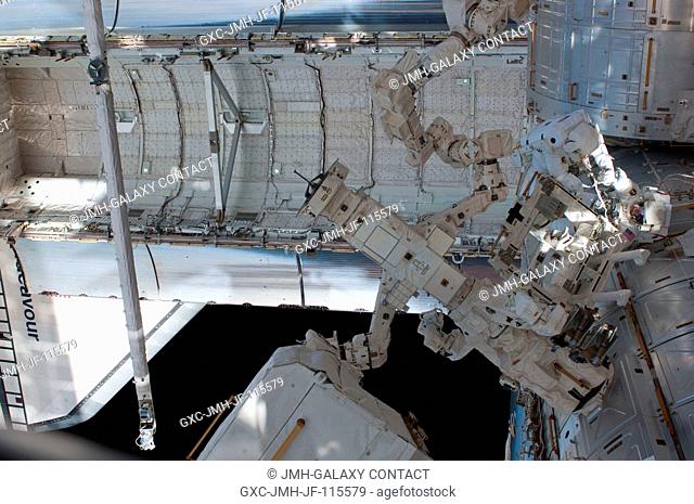 With various components of the International Space Station and part of the space shuttle Endeavour serving as a backdrop in the view
