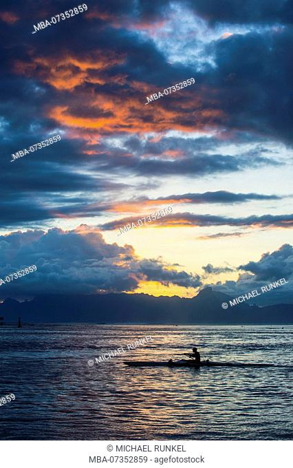 Dramatic sunset over Moorea , Papeete, Tahiti, French Polynesia